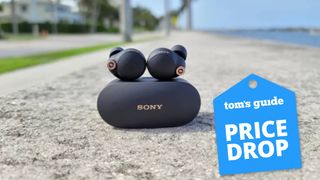 Sony WF-1000XM4 earbuds with a Tom's Guide deal tag