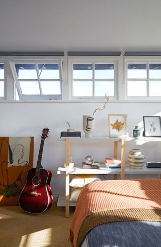 Small bedroom with windows