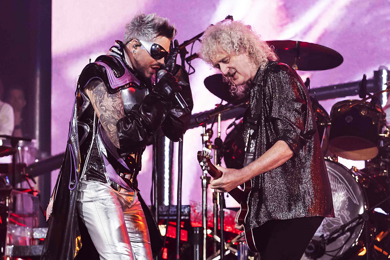 Adam Lambert performs with Brian May of Queen at BMO Stadium on November 11, 2023
