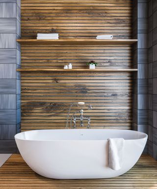 Bathroom with timber wood panels and freestanding tub