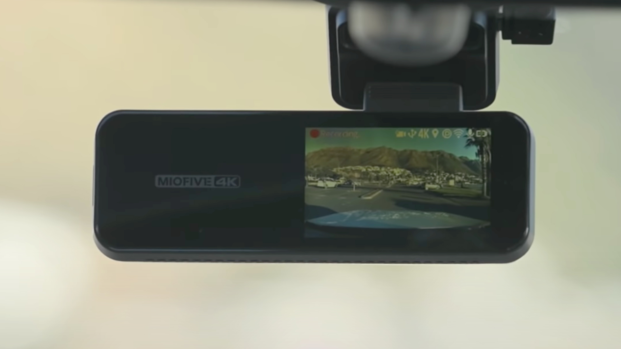 The Miofive 4K dash cam mounted on a car windhshield