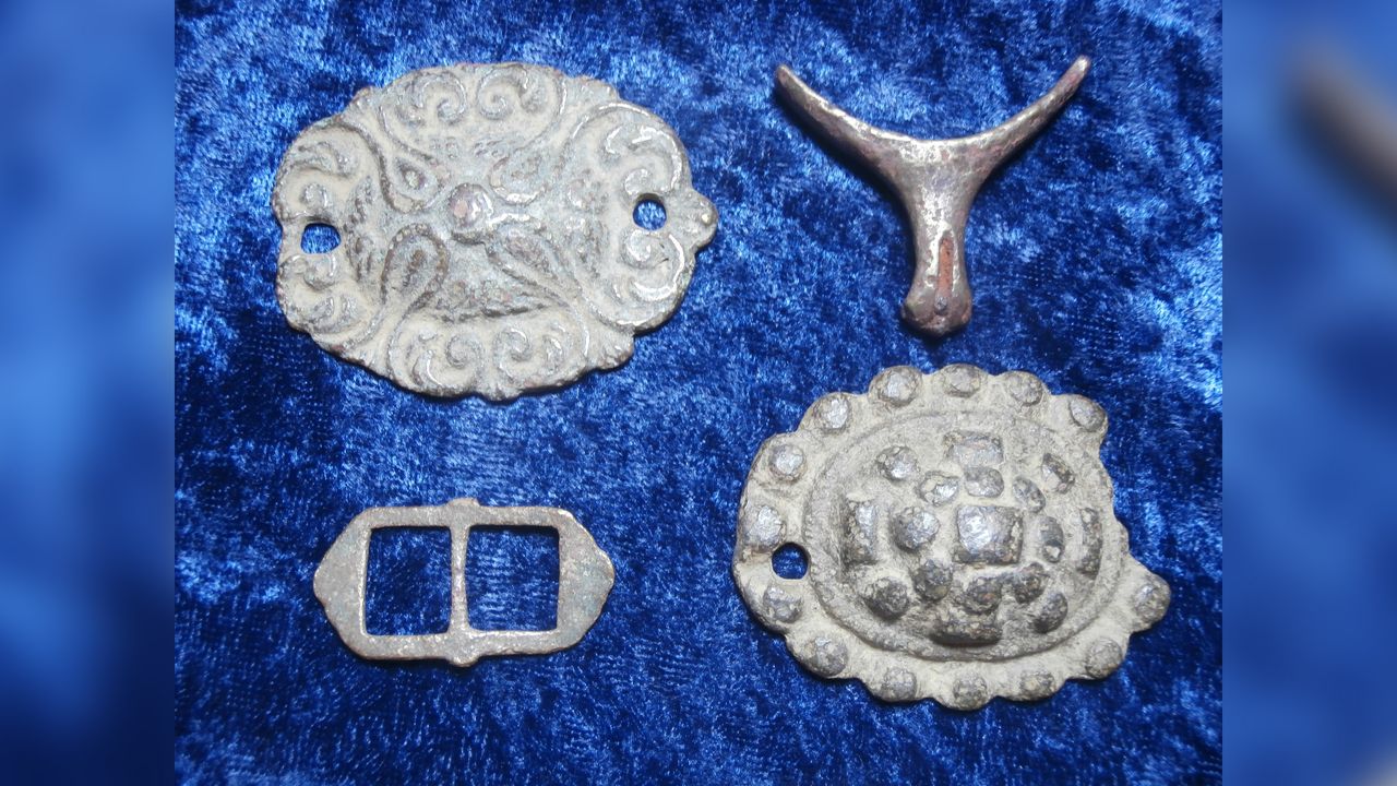 Bailey unearthed other metallic objects from the same period, including these&nbsp;bit-bosses from a horse's bridle, a buckle for a spur and part of a spur itself.&nbsp;