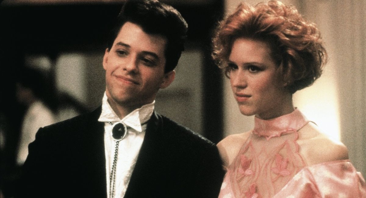 Jon Cryer and Molly Ringwald star in &#039;Pretty in Pink,&#039; written by John Hughes.