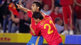 Raul and David Villa celebrate a Spain goal in 2006.