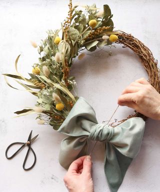 spring wreath with ribbon by Mary Elizabeth Flowers