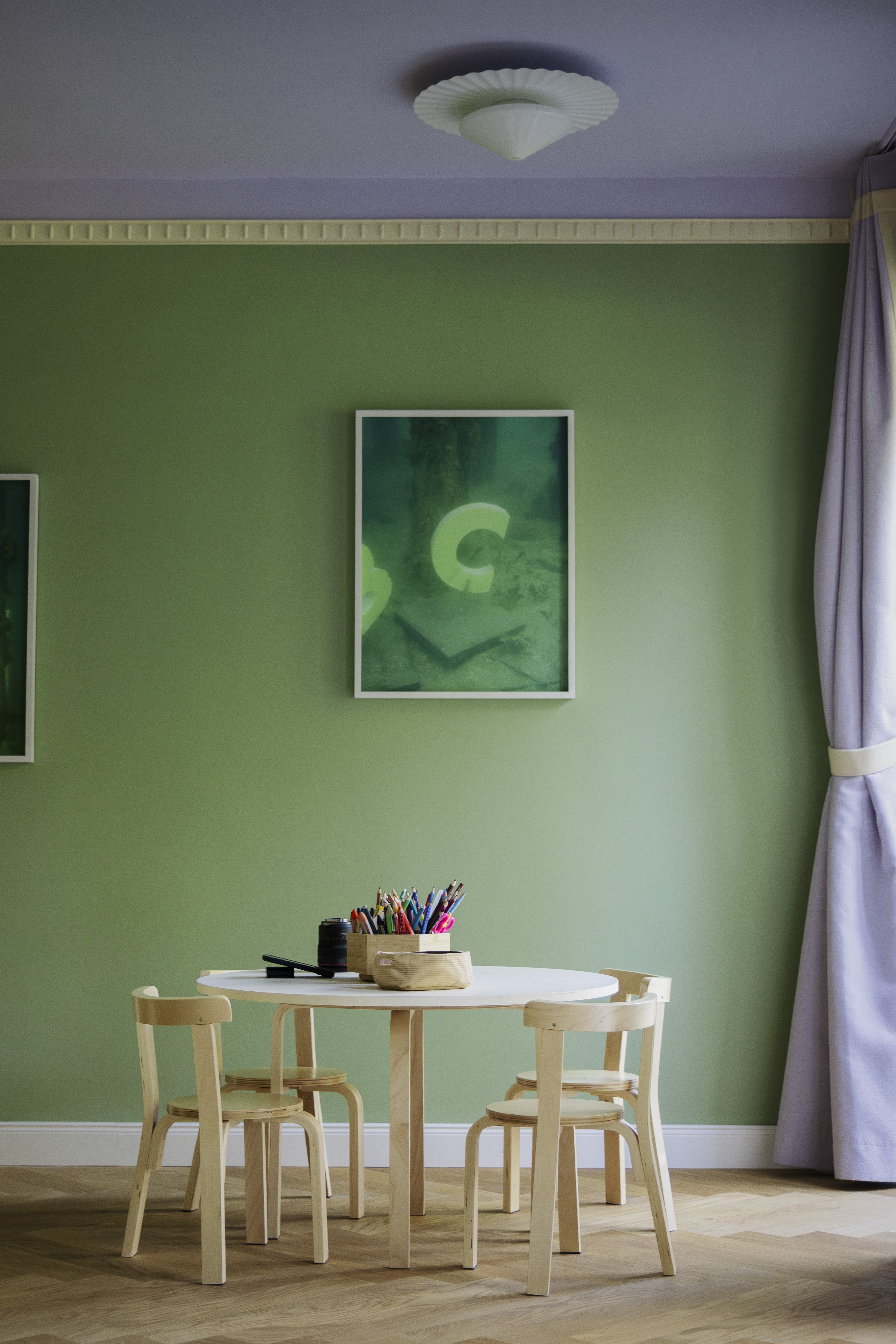 Balancedly designed interiors with plenty of natural light, pastel palettes, sculptural pieces, and curated artwork, with floor-to-ceiling walls and arched walls.