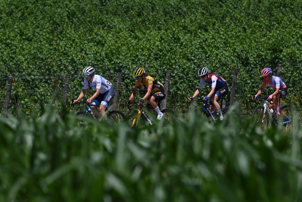 SAN LORENZO DORSINO ITALY JULY 09 LR Lucinda Brand of Netherlands and Team Trek Segafredo Anouska Helena Koster of Netherlands and Jumbo Visma Team Brodie Chapman of Australia and Team FDJ Nouvelle Aquitaine Futuroscope and Erica Magnaldi of Italy and UAE Team Adq compete in the chase group during the 33rd Giro dItalia Donne 2022 Stage 9 a 1128km stage from San Michele AllAdige to San Lorenzo Dorsino 727m GiroDonne UCIWWT on July 09 2022 in San Lorenzo Dorsino Italy Photo by Dario BelingheriGetty Images