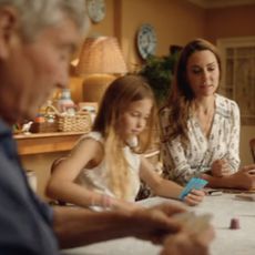 Michael Middleton playing cards with Princess Charlotte and Kate Middleton