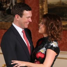 Jack Brooksbank and Princess Eugenie hugging on their engagement day