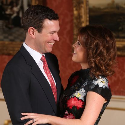 Jack Brooksbank and Princess Eugenie hugging on their engagement day