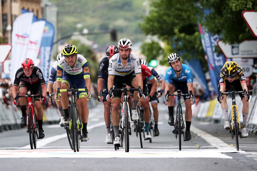 SAN SEBASTIAN SPAIN JULY 31 LR Odd Christian Eiking of Norway and Team Intermarch Wanty Gobert Matriaux Julian Alaphilippe of France and Team Deceuninck QuickStep Gonzalo Serrano of Spain and Movistar Team Jonas Vingegaard Rasmussen of Denmark and Team Jumbo Visma at finish line during the 41st Donostia San Sebastian Klasikoa 2021 a 2235km race from DonostiaSan Sebastian to DonostiaSan Sebastian Klasikoa on July 31 2021 in San Sebastian Spain Photo by Gonzalo Arroyo MorenoGetty Images