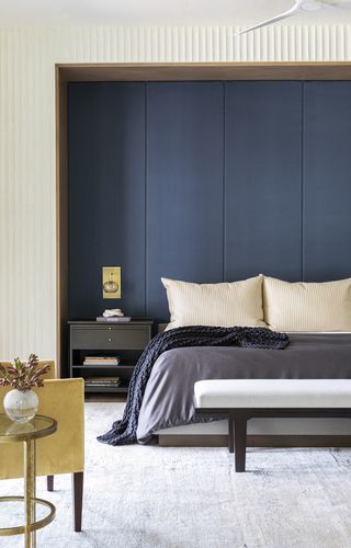 Create a bedroom with a difference by adding stripes to your space in an unusual way