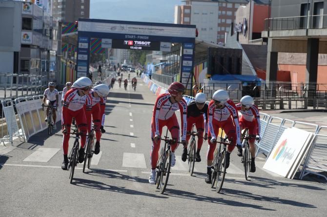 The Team Katusha squad head out for a training session