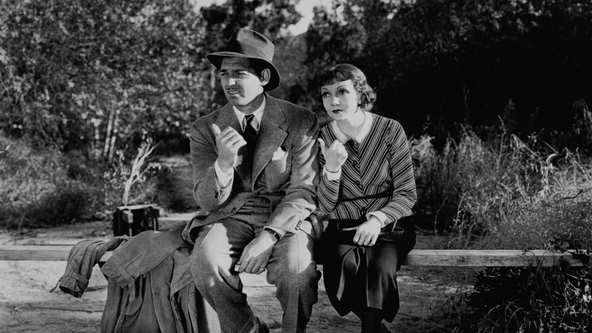 Clark Gable and Claudette Colbert hitchiking in It Happened One Night