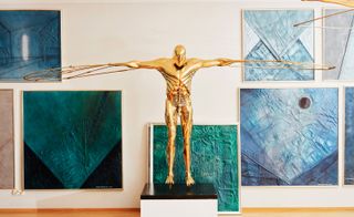 Sculpture by Björn Weckström with paintings in background