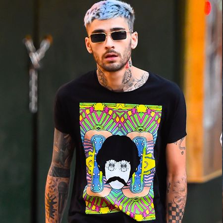 T-shirt, Clothing, Cool, Street fashion, Fashion, Eyewear, Top, Sleeve, Neck, Headgear,