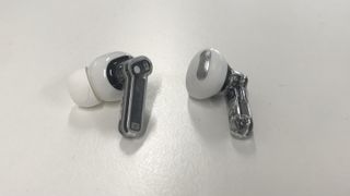 Nothing Ear (stick) left earbud beside the original Nothing Ear 1