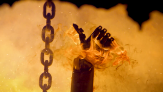 an F.02 robot being melted in molten steel showing a thumbs up sign
