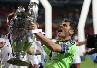 Iker Casillas celebrates with the Champions League trophy after Real Madrid's win over Atletico in the final in Lisbon in May 2014.