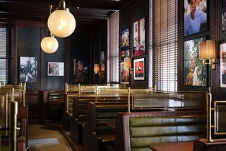 The dark and atmospheric Side Hustle Bar at The Nomad London