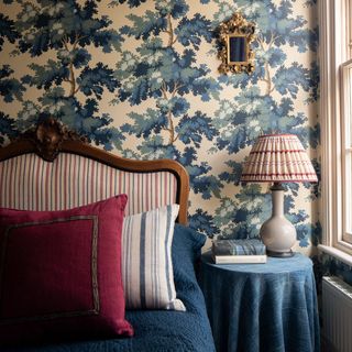 patterned bedroom with blue wallpaper