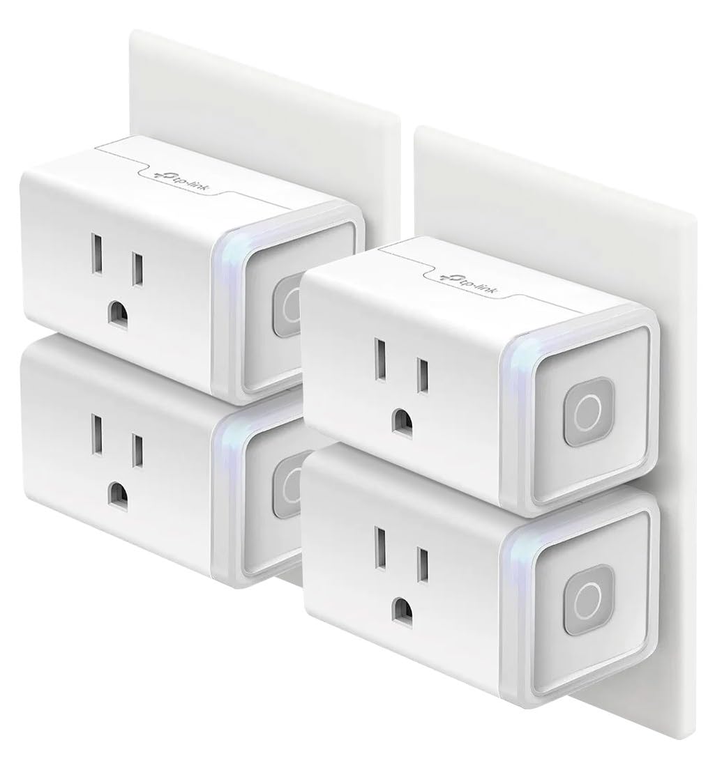 Four smart plugs plugged into outlets