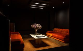 watch boutique interior with sofas