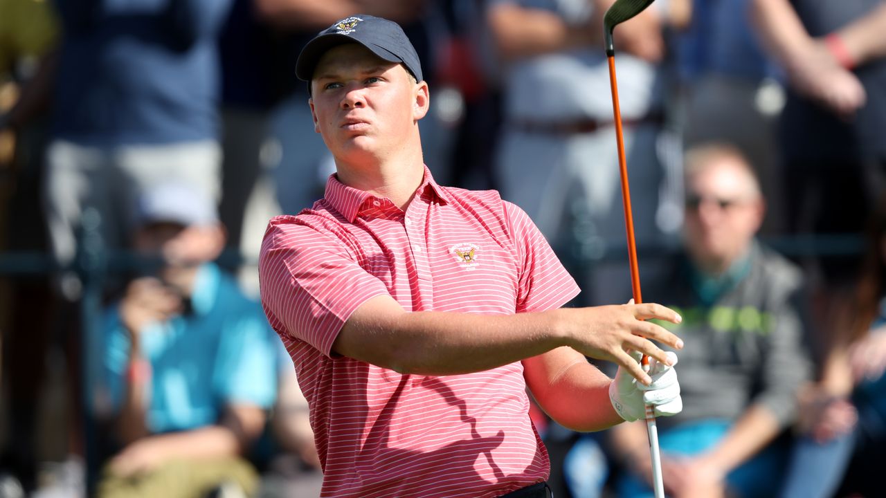 Caleb Surratt observes a shot at the 2023 Walker Cup