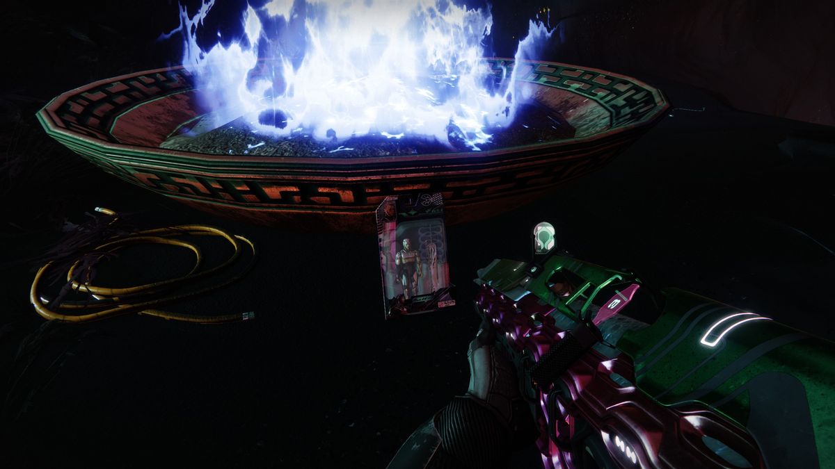 Destiny 2 action figure resting by a fire