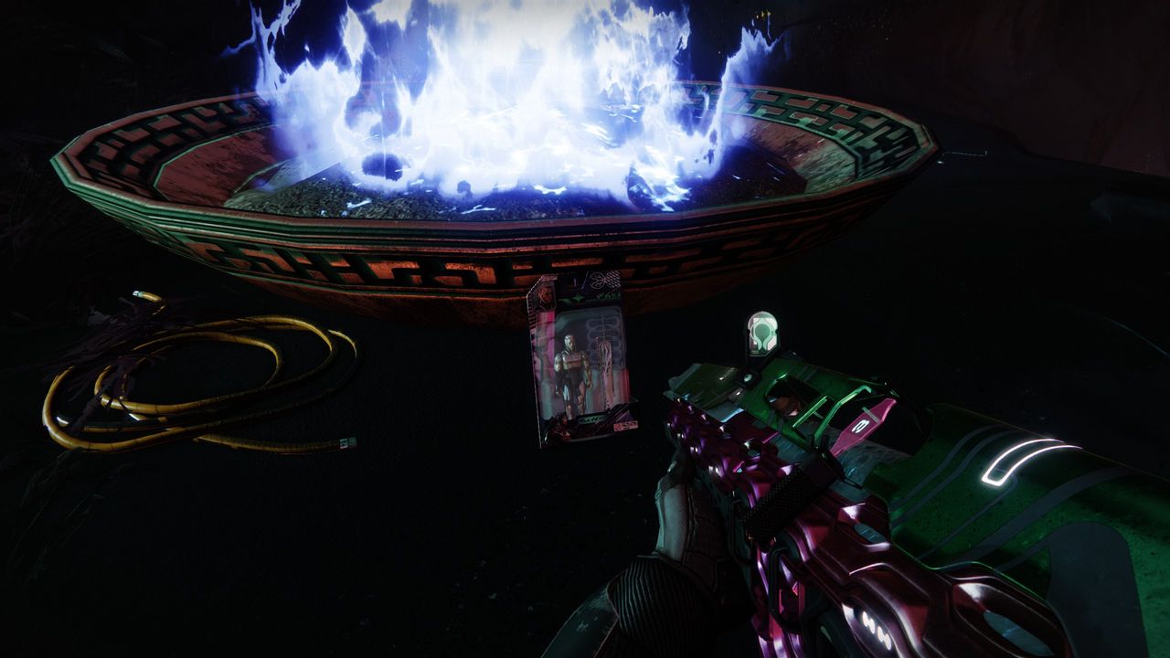 Destiny 2 action figure resting by a fire