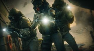 Soldiers ready to fire weapons in Rainbow Six: Siege