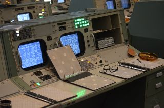 The restored Mission Control consoles have been dressed to match the preferences of the controllers who sat there.