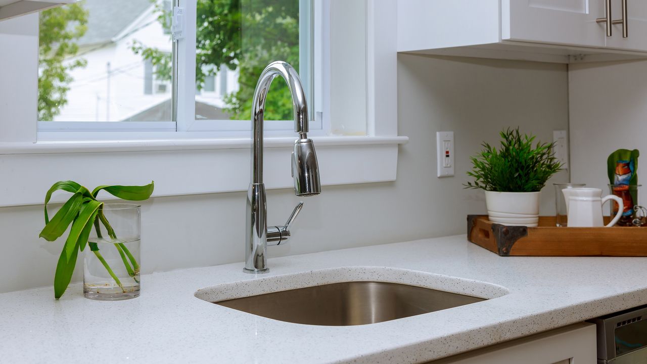 A kitchen sink in a modern kitchen