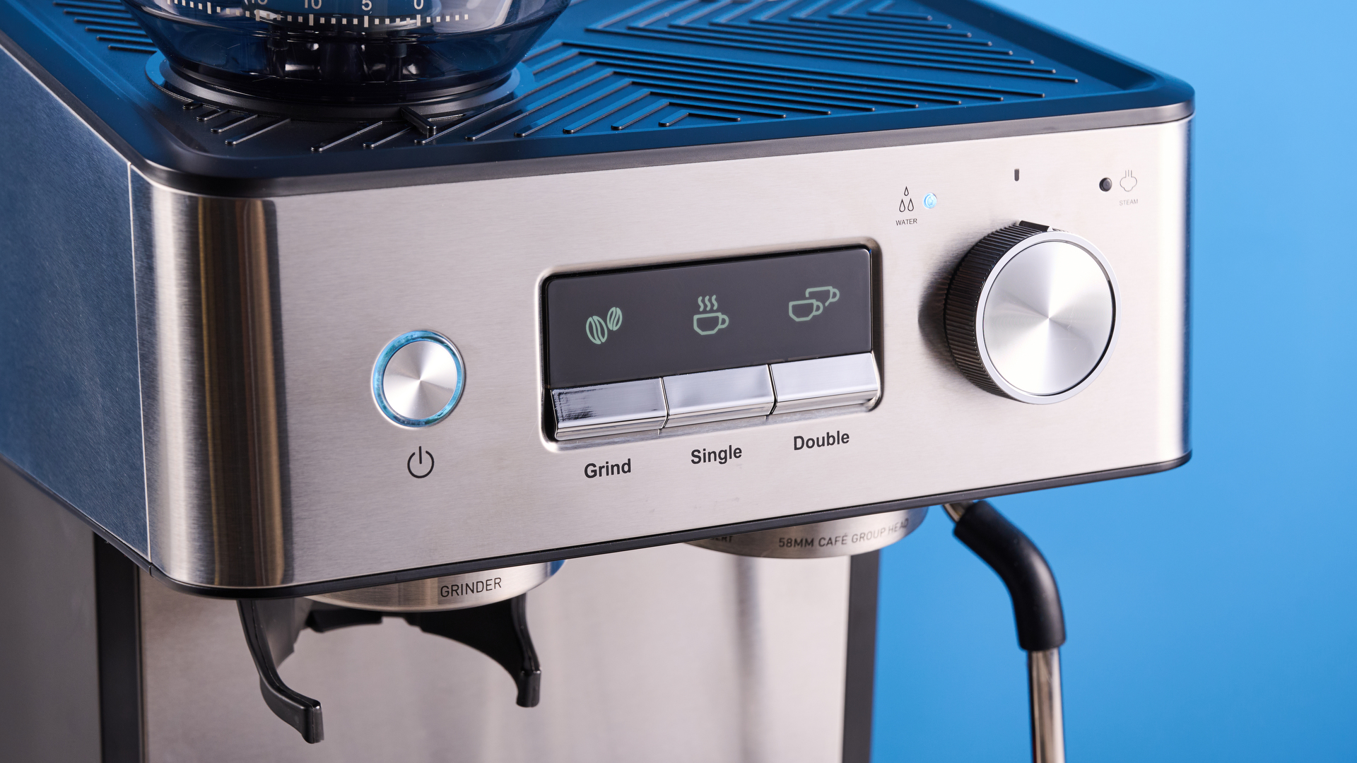 the gevi espresso machine with grinder showing its bean hopper, steam wand, and control screen with a silver dial and drip tray