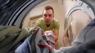 remove laundry from dryer