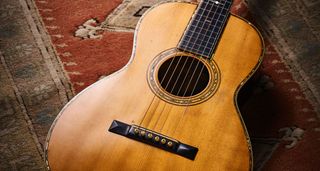 1928 Martin 00-42: this small-bodied acoustic is in perfect playing condition and is an excellent example of pre-war Martin.