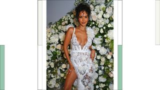 Maya Jama wears a white lace dress as she attends a party hosted by British Vogue and Chopard to celebrate the Cannes Film Festival at Hotel Martinez on May 22, 2023 in Cannes, France.