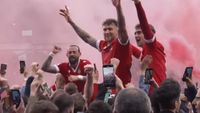 Players celebrating on the shoulders of fans in Welcome to Wrexham. 
