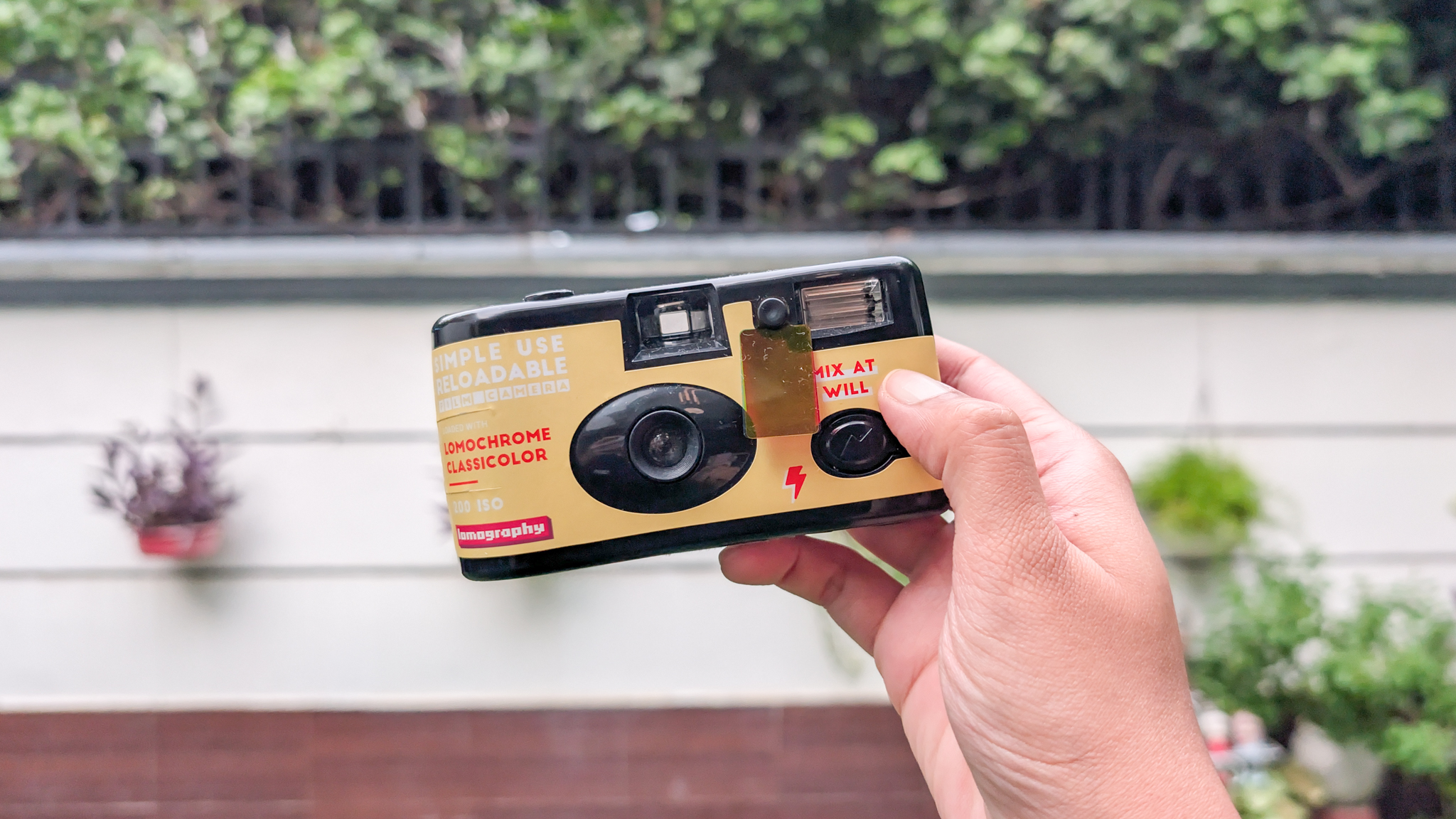A yellow Lomography Simple Use Reloadable Film Camera Classicolor film camera