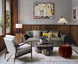 rustic living room with wood panelling and fall colors, floor lamp, table lamp, modern artwork