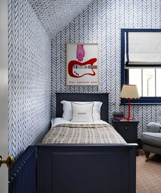 Kid's bedroom with blue wallpaper