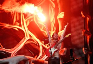 Frontman Simon Neil onstage at Reading Festival 2013.