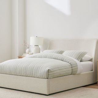 Layton Upholstered Bed against a white wall.
