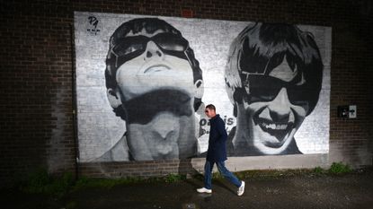 A mural depicting Liam and Noel Gallagher of Oasis, created by Manchester street artist Pic.One.Art., on the side of the Sifters Record store in Manchester