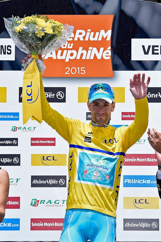 Vincenzo Nibali in yellow on the stage 6 podium.