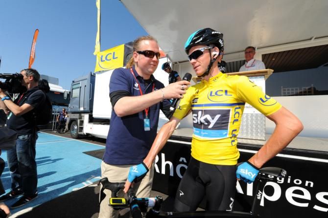 Chris Froome chats prior to the start of stage 4