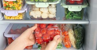 organized fridge with clear containers filled with food for easy access storage