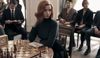 The Queen's Gambit Anya Taylor-Joy sits in the middle of a chess match