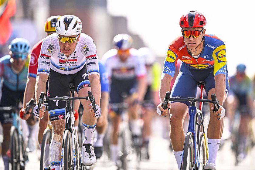 Quick-Step&#039;s Belgian team rider Tim Merlier and Lidl-Trek&#039;s Italian team rider Jonathan Milan cycle to the finish of the men&#039;s elite one day 250.3 Km (155 miles) cycling race &#039;Gent-Wevelgem - In Flanders Fields&#039; from Ieper to Wevelgem on March 30, 2025. (Photo by JASPER JACOBS / Belga / AFP) / Belgium OUT (Photo by JASPER JACOBS/Belga/AFP via Getty Images)