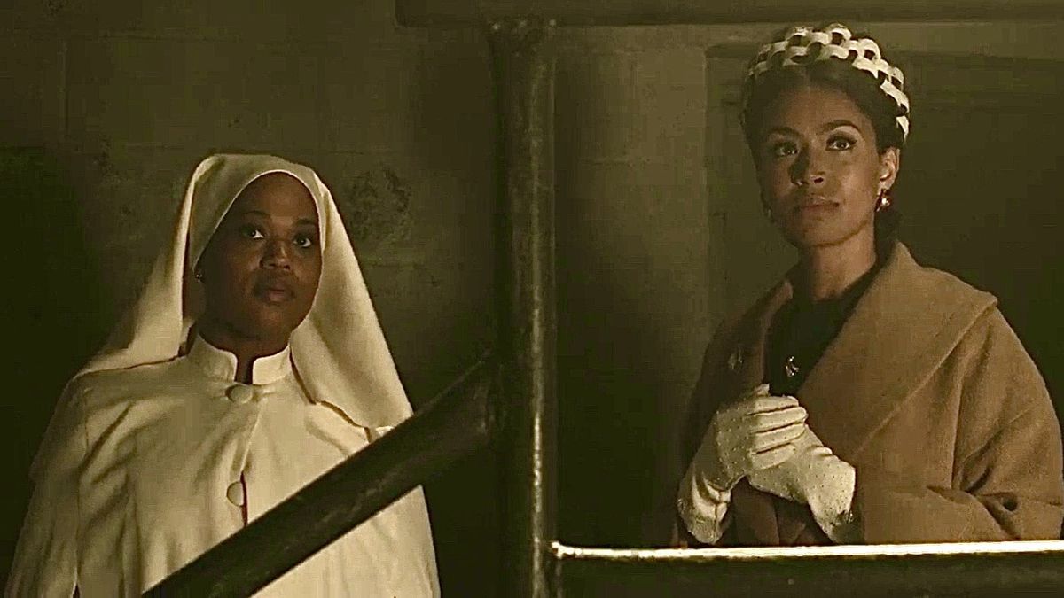 Antoinette Crowe-Legacy as Elise and Ilfenesh Hadera as Mayme appearing distraught in Godfather of Harlem